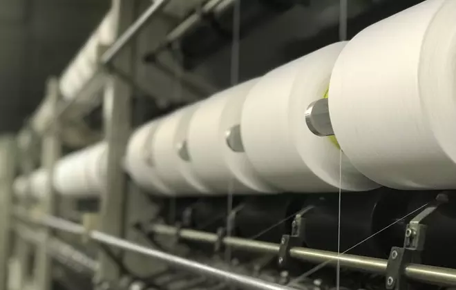 Zoom on Covering machines at the İSİSTAŞ manufacturing site located in Turkey